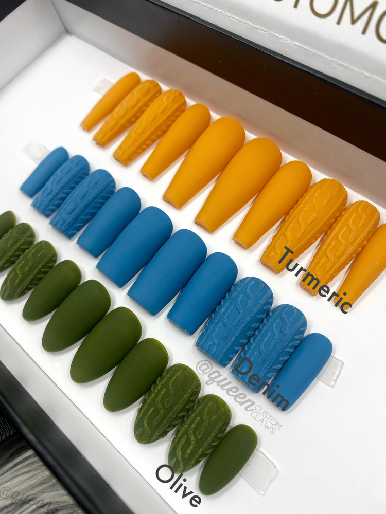 a display of different colors of nails